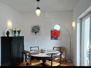 a dining room with a table and some chairs at Pinhão House in Pinhão +44 photos
