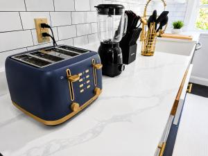 a blue tool box sitting on top of a kitchen counter at Sleeps 6 Near Boston, Providence & Gillette in Attleboro