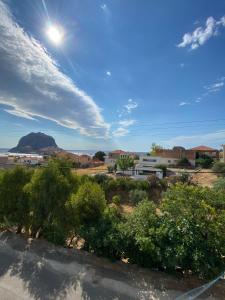 a view of the desert with a mountain in the background at Mu Caza Monemvasia in Monemvasia