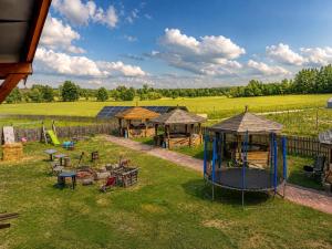 an aerial view of a park with a playground at Farma Puchałowo in Puchałowo