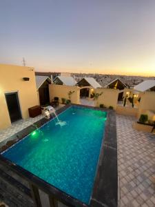 a swimming pool on the roof of a building at North paradise hotel in Irbid