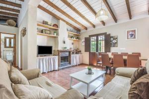 a living room with a couch and a table at Casa Villazo 1 in Málaga