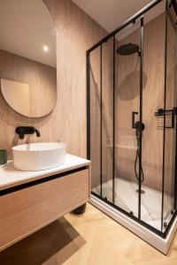 a bathroom with a sink and a shower at Villa Sunce Beachfront in Podgora +82 photos