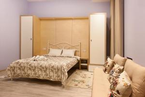 Postel nebo postele na pokoji v ubytování Basseynaya Apart Hotel