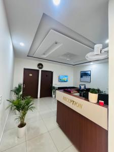 an office with a reception desk and a reception counter at hotel capetown in Sirsa