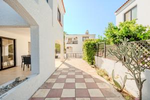 a walkway in a house with a patio at Merika Complex 1 in Perivolia