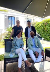 a group of people sitting on a chair at Villa Pruly Hotel Cannes Centre in Cannes