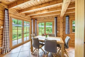 a dining room with a table and chairs at Jäckleshof in Sankt Georgen im Schwarzwald