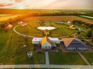 an aerial view of a farm with a building at Chalets Franciska Major, Pro Village in Sopronkövesd