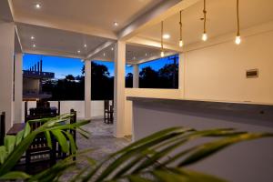 a house with a view of the night at Bay Marina in Arugam Bay
