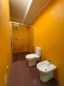 a bathroom with a toilet and a shower and a sink at ARTEAMARE in Vignanotica in Mattinata +95 photos