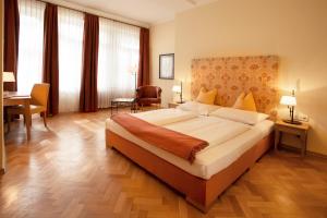 Cama ou camas em um quarto em Hotel Villa Florentina