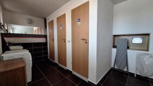 a bathroom with a toilet and a sink at Ubytování U Včelek in Horní Dubňany +14 photos