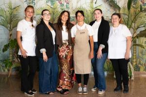 a group of women posing for a picture at Hotel Baby in Milano Marittima