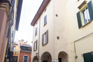 an alley in a city with buildings at Nel Cuore di Bologna M ,Bologna by Shortholidays in Bologna +7 photos
