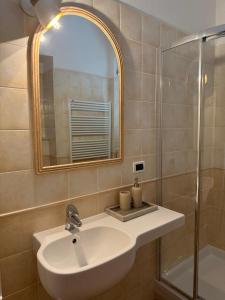 a bathroom with a sink and a shower at Casa Ninni in Casalino