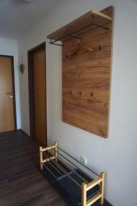 a room with a wall with a wooden wall at Ferienwohnung Heidi in Mariapfarr