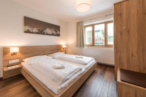 Postel nebo postele na pokoji v ubytování Apartment Bacher