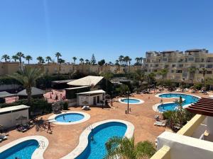 an aerial view of a resort with three pools at Dumar Puerto Rey in Vera