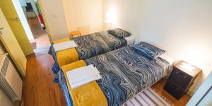 a small living room with a couch and a couch at Spacious House in Seia with Stunning Mountain Views, 150 m² in Seia
