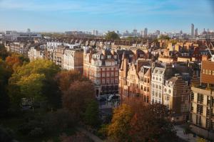 an aerial view of a city with buildings at Jumeirah Carlton Tower London in London