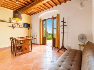 a living room with a table and a couch at Villa Le Balze Large Private Pool WiFi in Florence