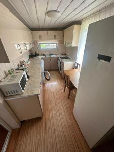 an overhead view of a kitchen with a counter top at Guest House Babi in Letsperi