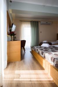Cama o camas de una habitación en Olympion