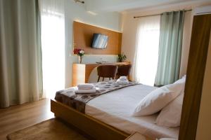 Cama o camas de una habitación en Olympion