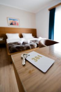 Cama o camas de una habitación en Olympion