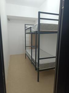 a room with two bunk beds in a room at Urban hostel Saryarka in Astana +2 photos