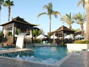 a pool at a resort with a water slide at Crystal Family Comfort Collection - Ultimate All Inclusive in Belek