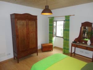 Posteľ alebo postele v izbe v ubytovaní Villa Canaria piscina jacuzzi jardín