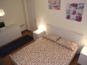 En eller flere senge i et værelse på Appartement au Chateau Vallaya + 29 billeder