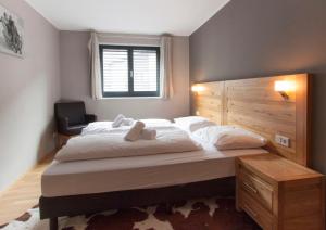 A bed or beds in a room at Appart Laijola