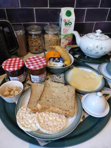 a plate of food with bread and other ingredients on a counter at Fleur de Lys - Free wi-fi & parking in La Haye