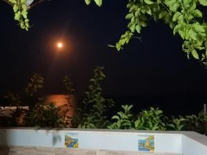 a night view of a street light in the dark at Casa Emi in Amalfi