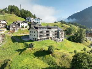 an aerial view of a house on a hill at Residence Froy in Resia