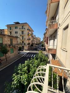 a view of a street from a balcony of a building at Silviaapartment in Battipaglia