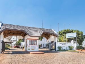a building with a roof on top of it at Constantia Hotel and Conference Centre in Midrand
