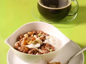 a bowl of food on a table with a cup of coffee at Bed and Breakfast Acrobatic in Villa San Giovanni