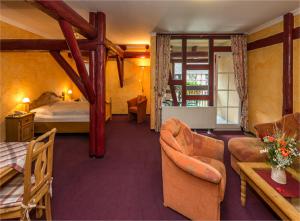 Postel nebo postele na pokoji v ubytování Hotel Gut Voigtlaender + 34 fotografií