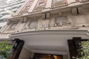 a doth hotel sign on the side of a building at Dorá Hotel Buenos Aires in Buenos Aires