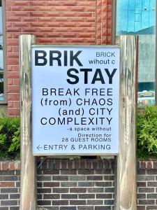 a sign on the side of a brick building at 브릭스테이 brikstay in Gyeongju +28 photos