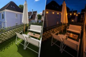 a patio with a table and chairs and an umbrella at Maison aux portes de Strasbourg moderne et tout confort in Schiltigheim
