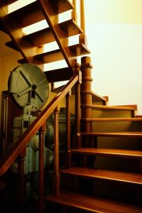 a set of wooden stairs in a room at Bed & Breakfast Spigolatrice in Sapri