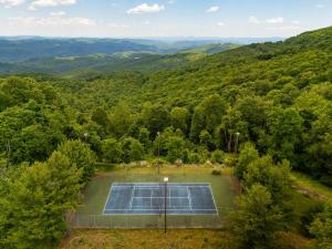 an aerial view of a tennis court in the mountains at Appalachian Mountain Lodge in Boone