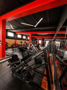 a gym with a bunch of bikes in a room at hotel spa 360 villa de leyva in Villa de Leyva +4 photos