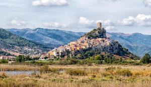 a small town on top of a mountain at Affittacamere Vacanze a Posada in San Giovanni