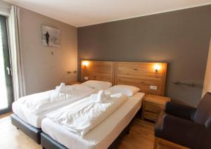 A bed or beds in a room at Appart Laijola